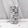 Assorted shiny matte 3cm Christmas balls in red, gold, silver, blue, and pink colours.