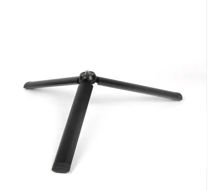 Black aluminium alloy PTZ mobile phone tripod stabiliser mounted with an iPhone.