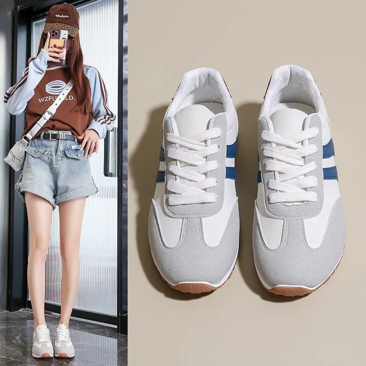 Blue and grey striped leisure sports shoes with round toe and flat rubber sole.