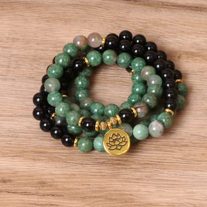 Green and black elastic beaded alloy bracelet with natural style design