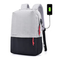 15-inch polyester canvas backpack in black with zipper closure, laptop pocket, phone bag and double straps