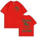 Man wearing a loose-fit linen t-shirt with a 'Rise And Grind Green Coffee Fun Expression Bag' cartoon graphic print.