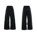 Men's dark grey cotton sports suit with V-neck short sleeve jacket and matching bottoms showing padded shoulder detail