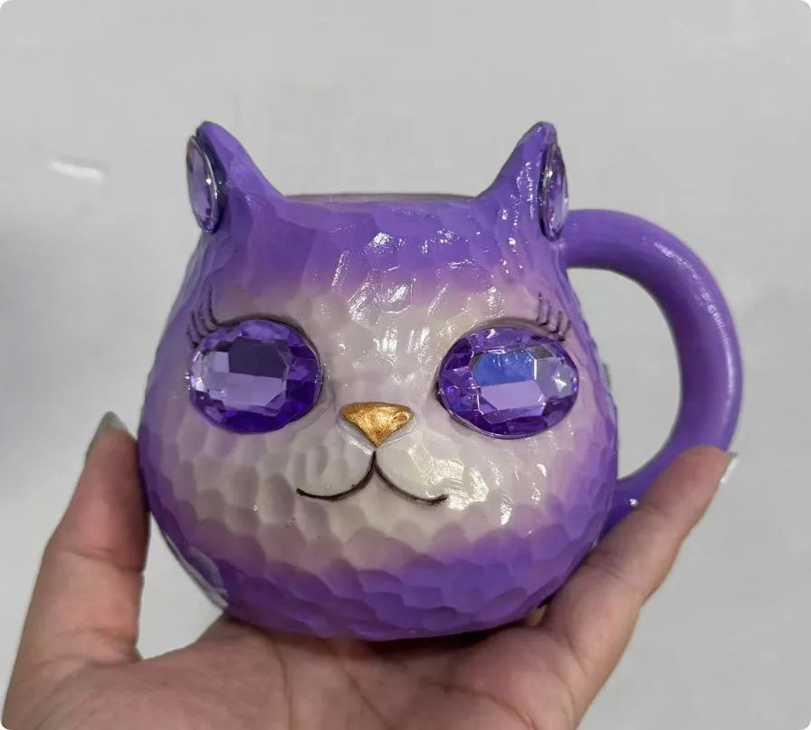 Resin crystal earth cat cup craft ornament in blue, green, pink or purple for promotional gifting.