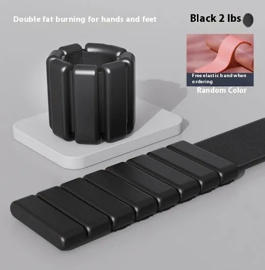 Velcro silicone fitness bracelet with detachable weight in black, blue, gray, or pink.