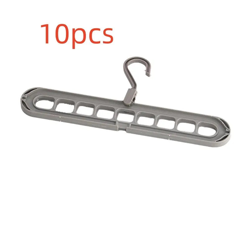 Plastic nine-hole folding trouser hanger in beige, blue, grey, green, or pink colour