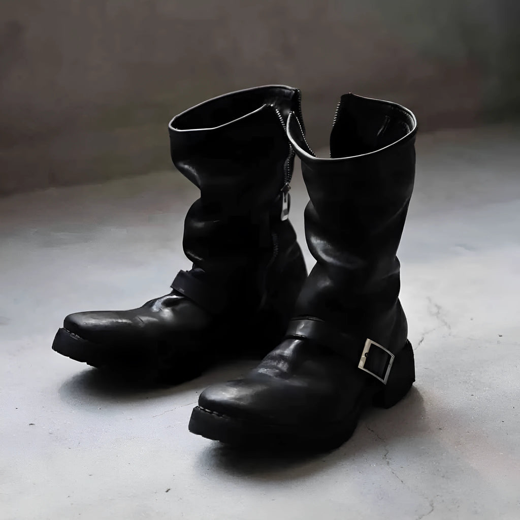 Men's black retro-style zip-up Martin boots with a round toe on a plain background.