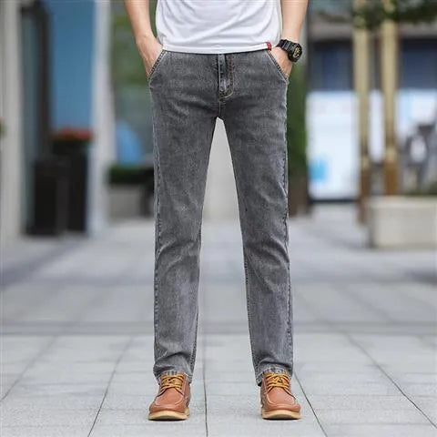 Men's straight leg jeans in smoky gray colour with low waist and zipper fly closure