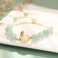Rabbit charm bracelet with green aventurine or strawberry quartz stones on gold-plated chain