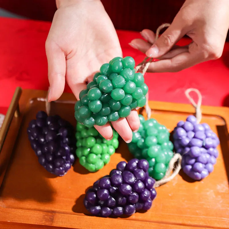 Purple and green grape cluster handmade soap bars showing grape design moulded into surface