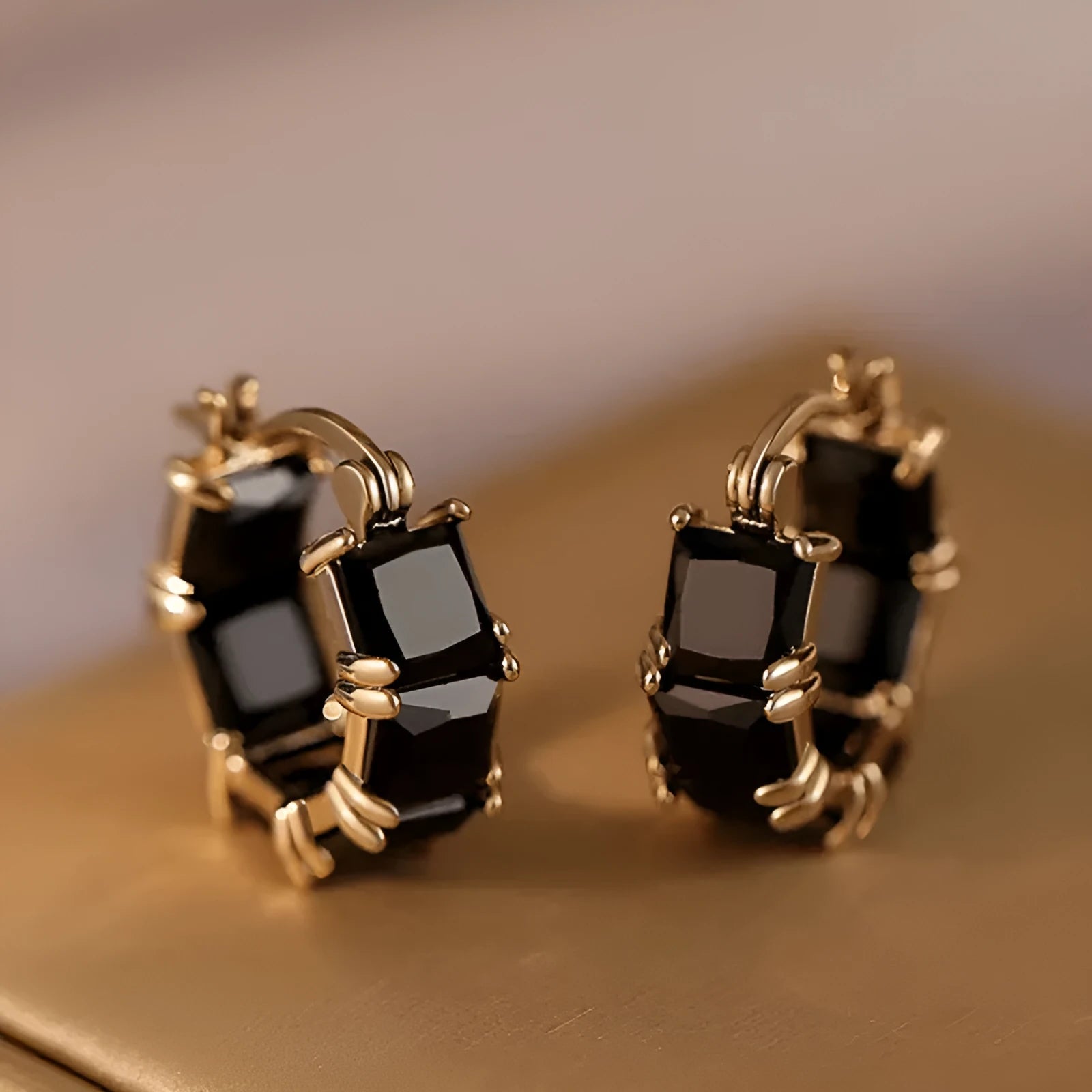 Geometric U-shaped women's earrings with round zircon crystals in gold plating