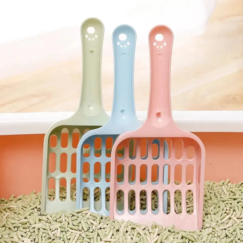 Blue plastic cat litter scoop on a white background, showing its 20cm length and scoop shape.
