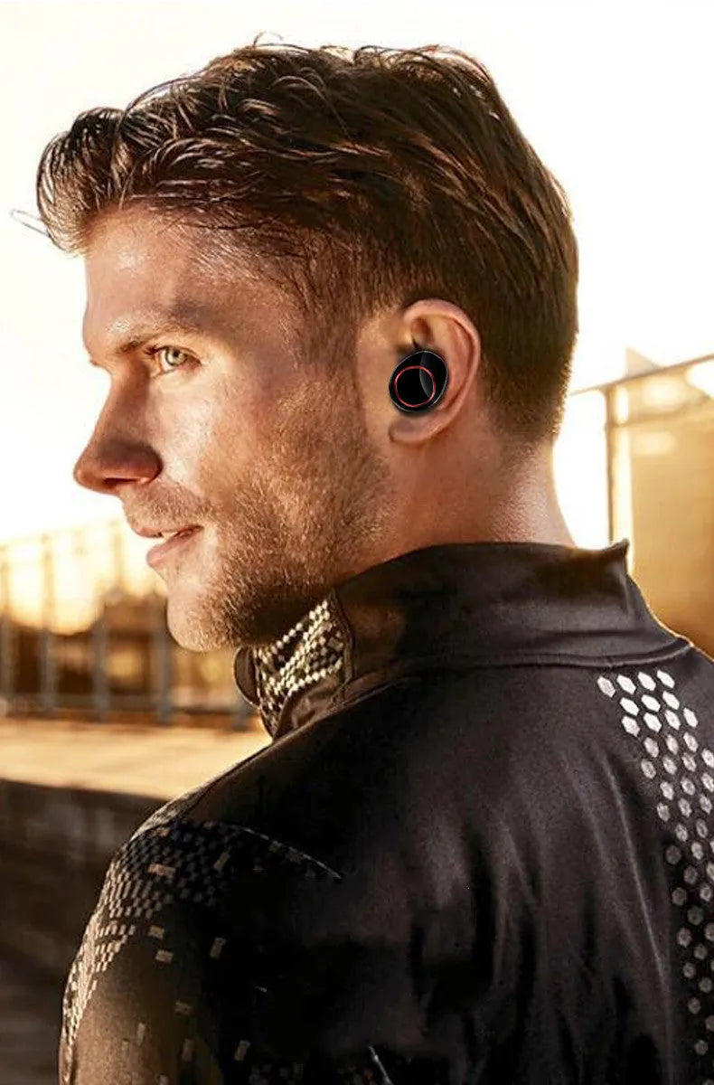Black X11 Sky-Free true wireless Bluetooth earbuds with compact charging case on a white background.