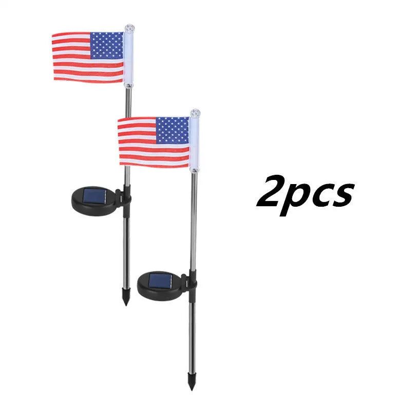 Solar-powered garden flag light with stainless steel pole displaying American or British flag design