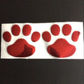 PVC car sticker pair with hand-shaped brush design showing dog footprints in multiple colour options