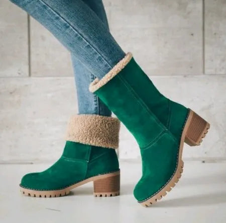 Women's black suede mid-calf snow boots with a round toe and flat low heel.