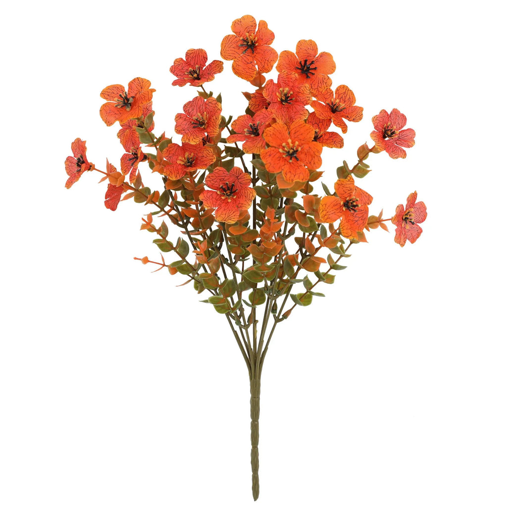 Artificial flower bouquet in autumn orange, red, and yellow colours for home or wedding decoration.