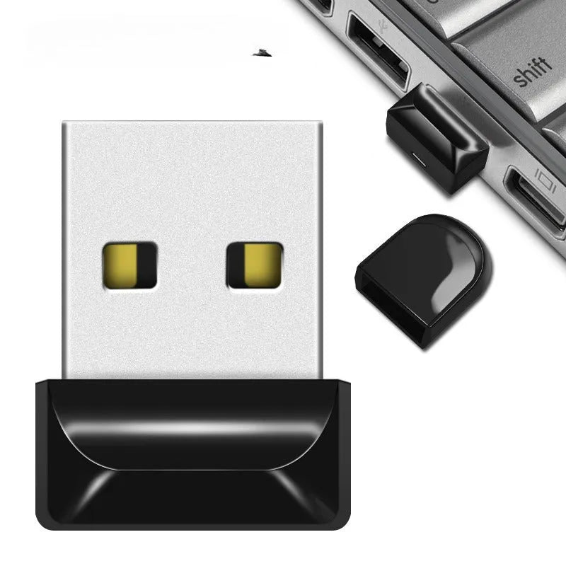 Silver metal USB flash drive on a keyring chain against a dark background