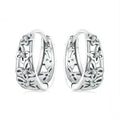 Sterling silver hollow butterfly earrings with zircon accents and retro animal modelling design