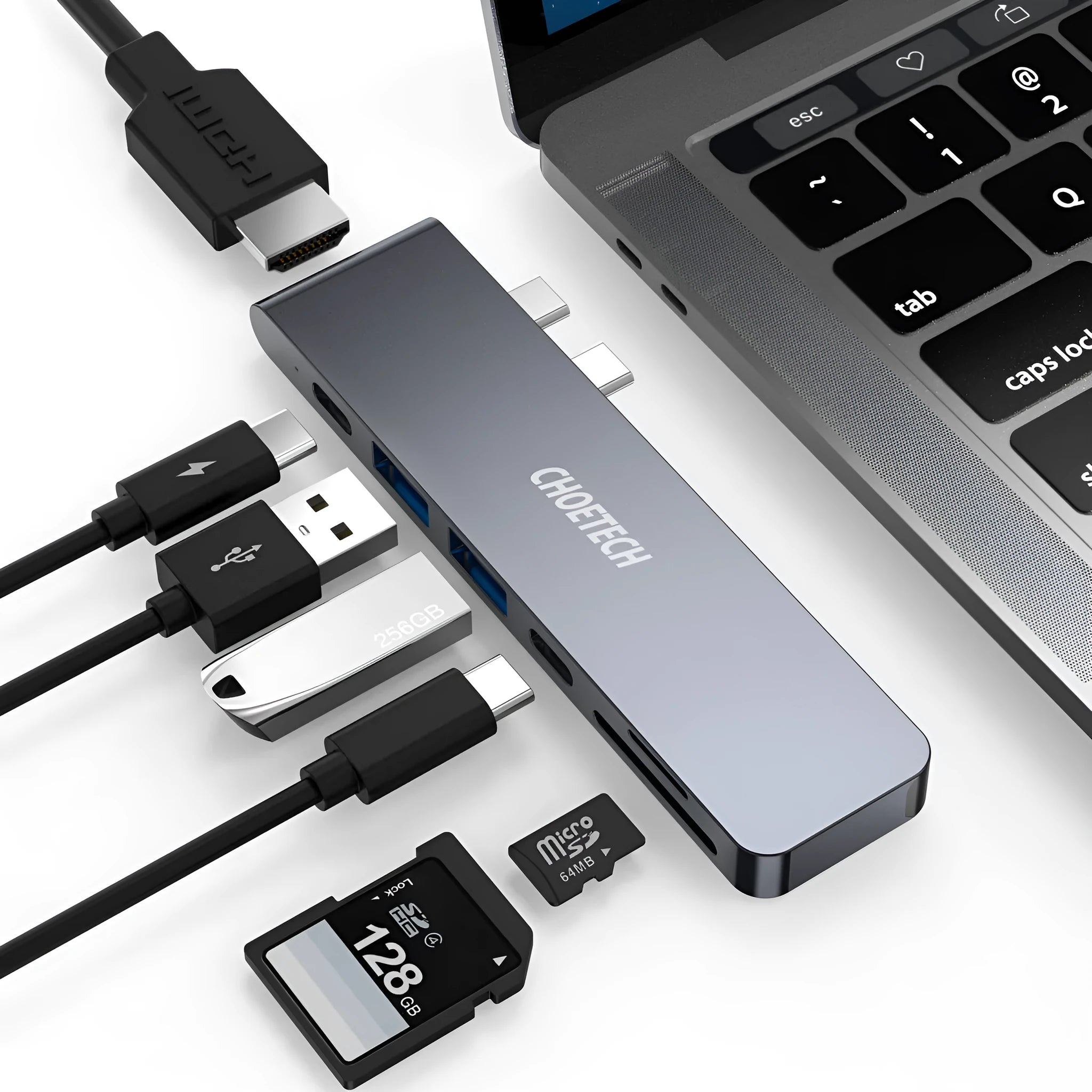 USB Type C adapter hub with multiple ports including Thunderbolt 3, HDMI, SD card slot, and USB 3.0