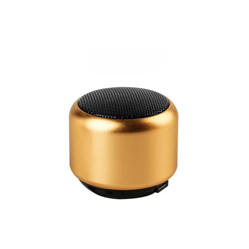 Small portable Bluetooth speaker in black, blue, gold, or pink colour options.