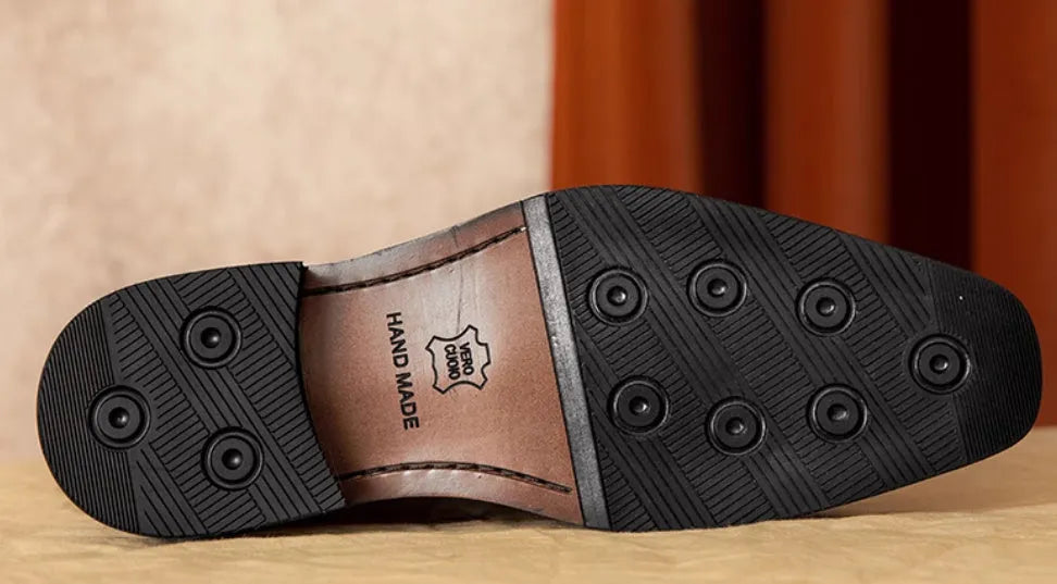 Men's black genuine leather slip-on loafers with fringed detailing and rubber sole