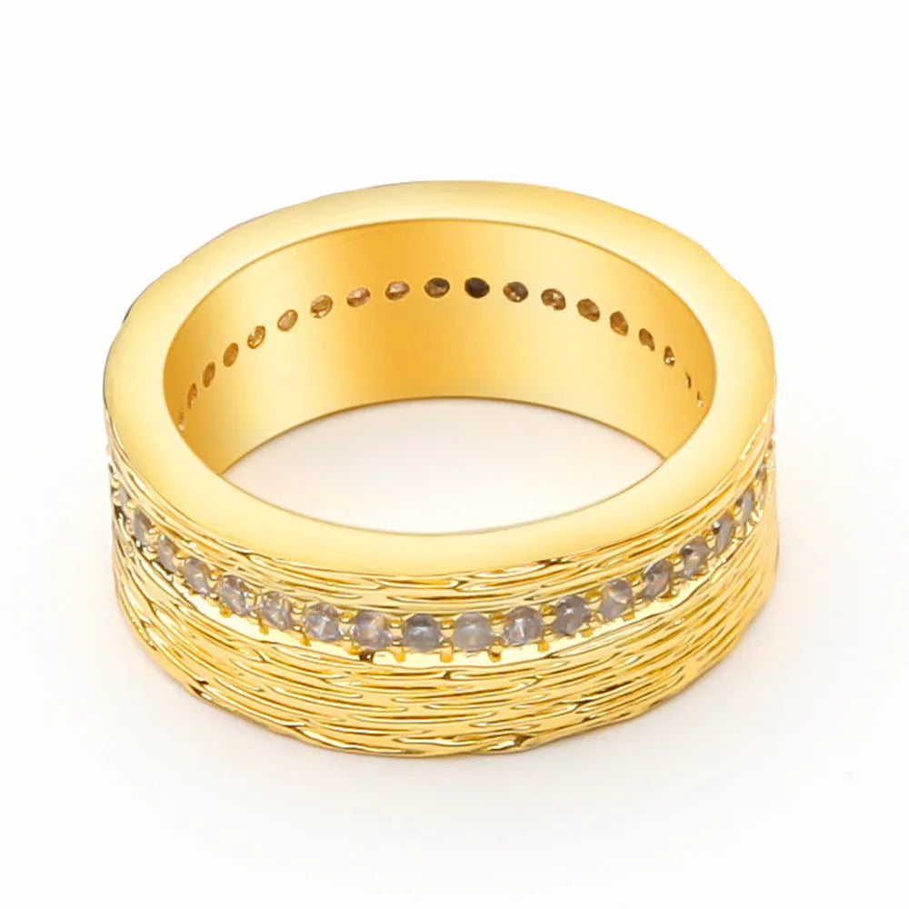 Geometric gold-colour women's zircon ring showing angular design on copper base with electroplated finish