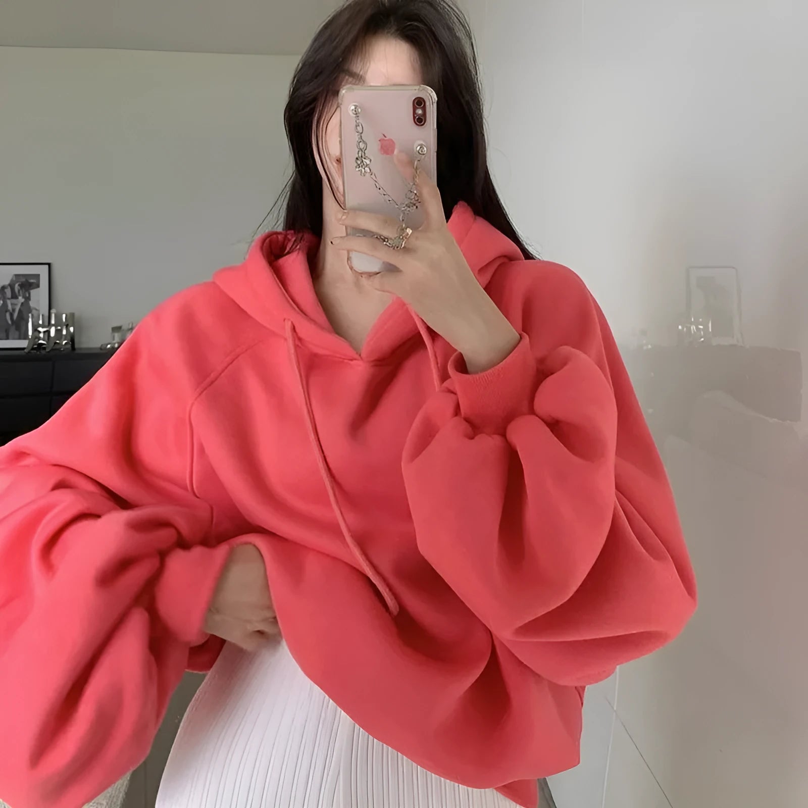 Watermelon red women's loose hooded pullover sweater made from mulberry silk fabric.