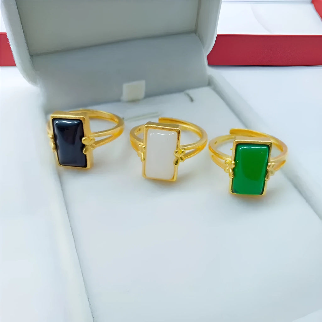 Adjustable brass gold-plated ring with electroplated gemstone in black, green or white options