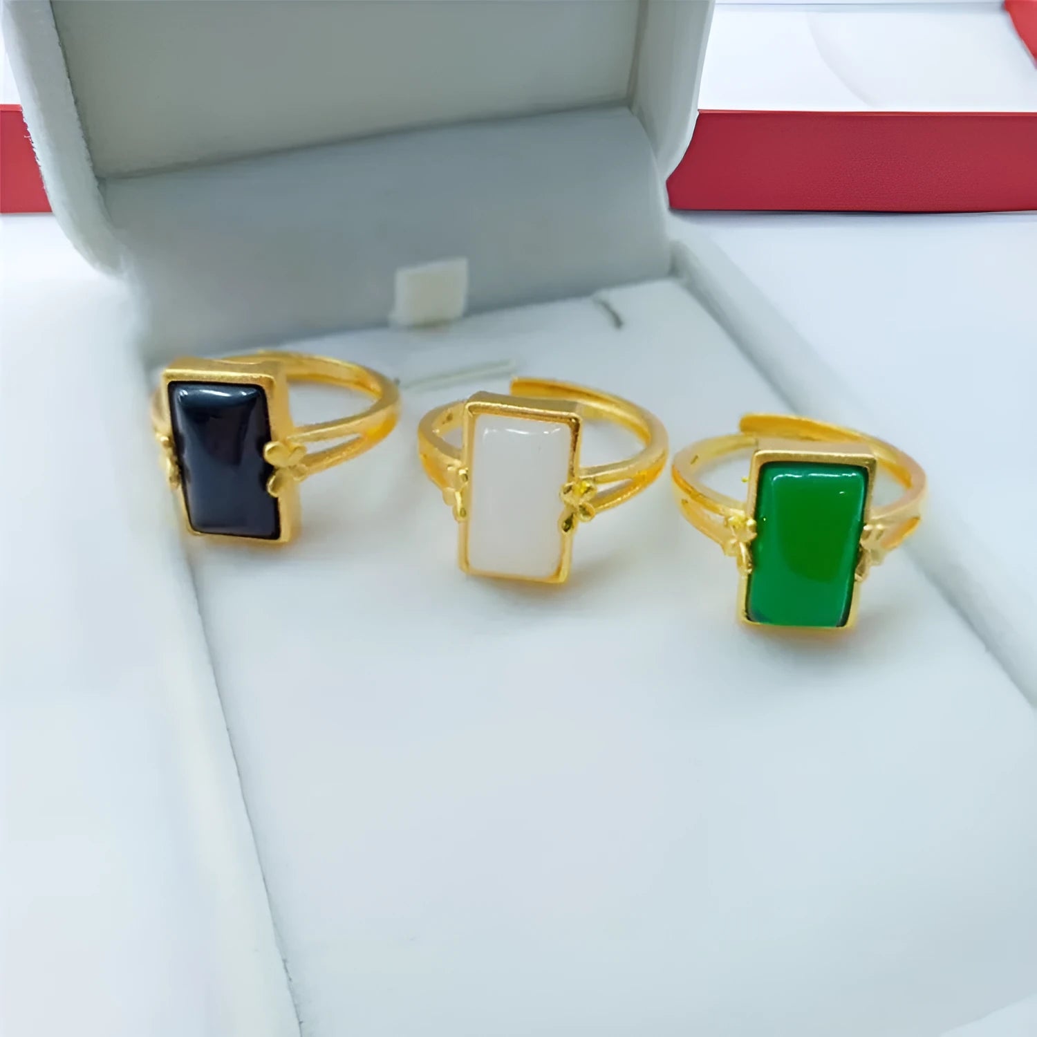 Adjustable brass gold-plated ring with electroplated gemstone in black, green or white options