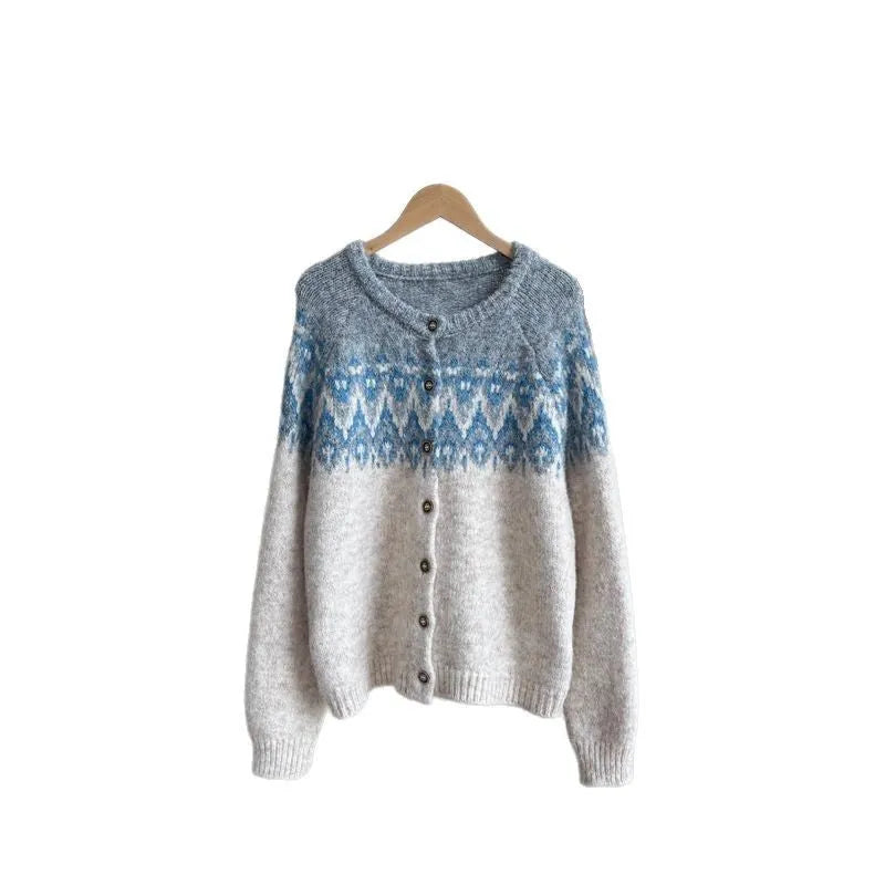 Women's loose fit jacquard knit sweater coat in milky white, shown on a hanger.