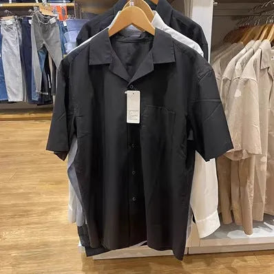 Men's beige modal cotton open collar casual shirt with regular sleeves on a hanger.