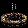 Natural citrine scattered beads ball bracelet showing polished gemstone beads in an original design.