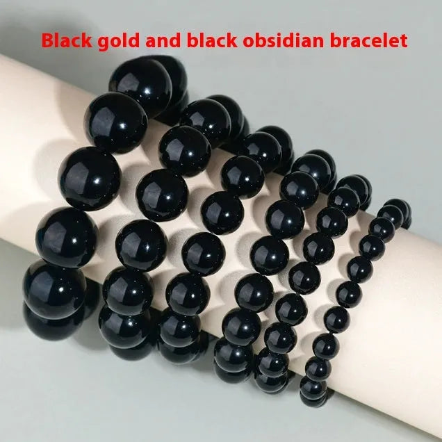 Hand-woven round obsidian crystal bracelet in ethnic style on a wrist, showing colour and bead size options.