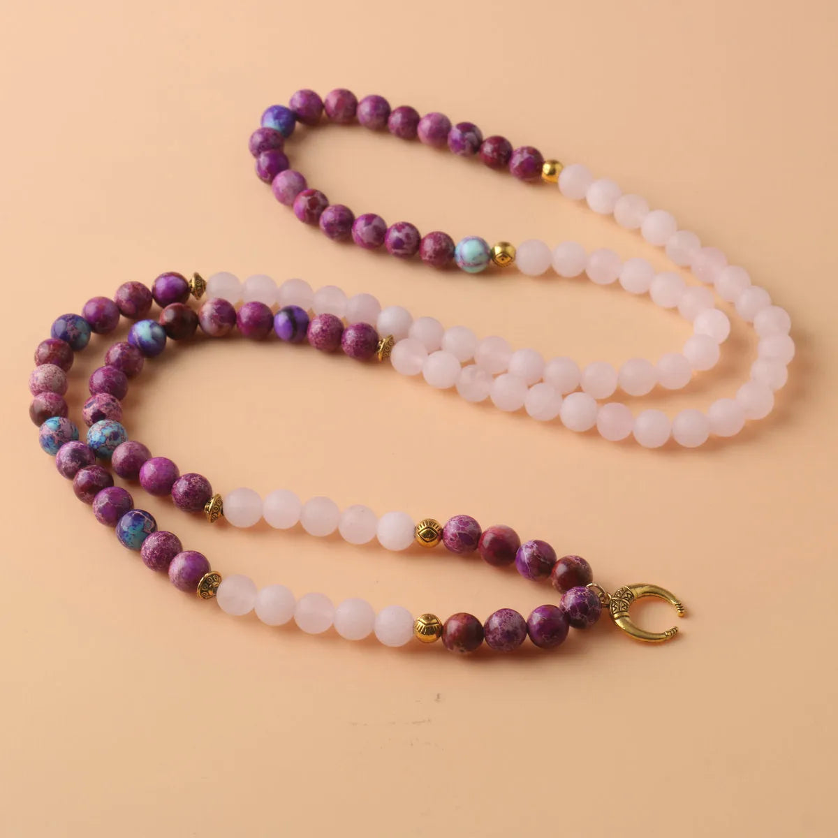 Round pendant necklace with pink crystal emperor stone and personalised bead design on chain