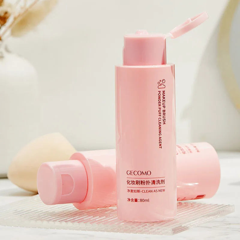 Makeup brush cleaner kit with 80ml detergent bottle and 75ml wash-free spray bottle.
