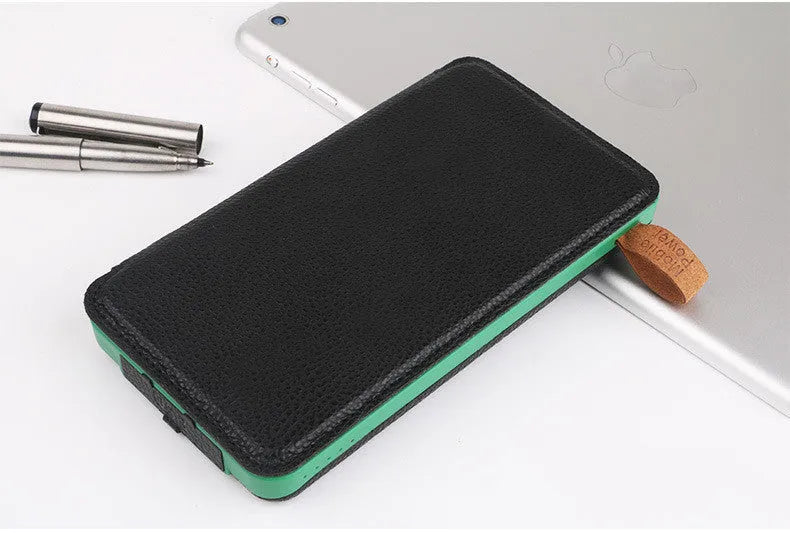 Outdoor solar power bank in black with solar panel, LED light, and soft leather exterior.