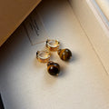 Gold-plated geometric earrings with tigereye stone beads in French retro style
