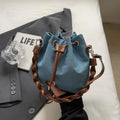 Blue one-shoulder cross body bucket messenger bag with synthetic leather lining