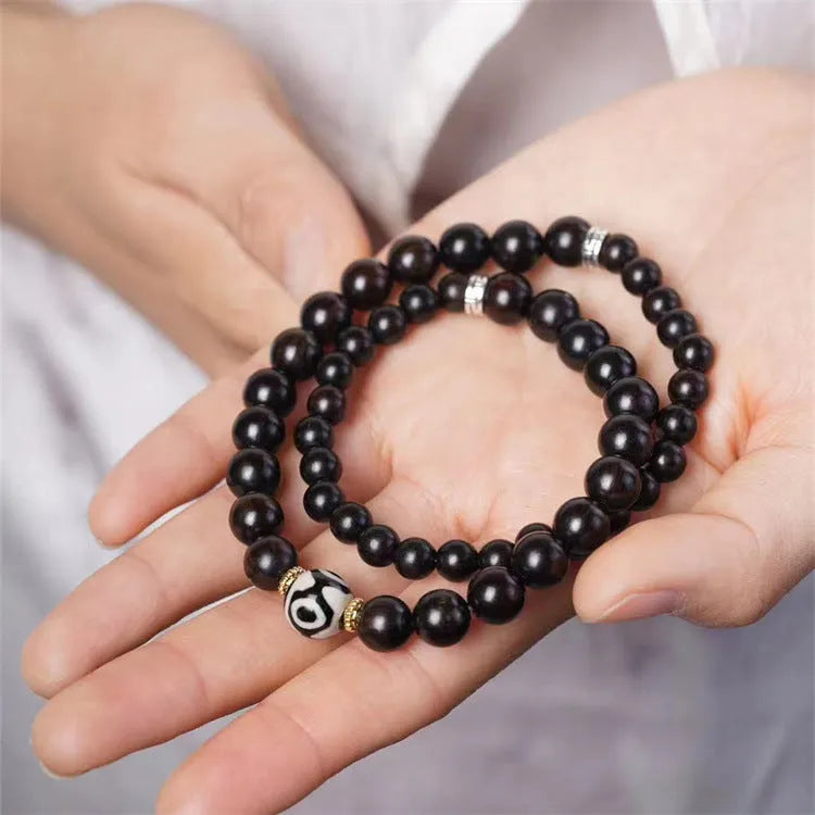 Ebony wooden Tibetan beads bracelet with two circles in 8mm unisex design