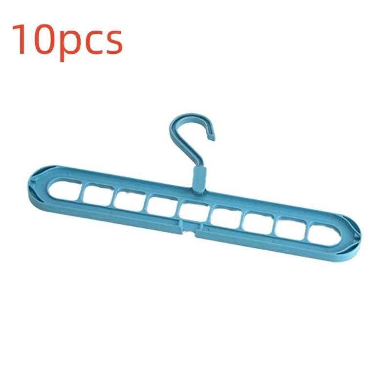 Plastic nine-hole folding trouser hanger in beige, blue, grey, green, or pink colour