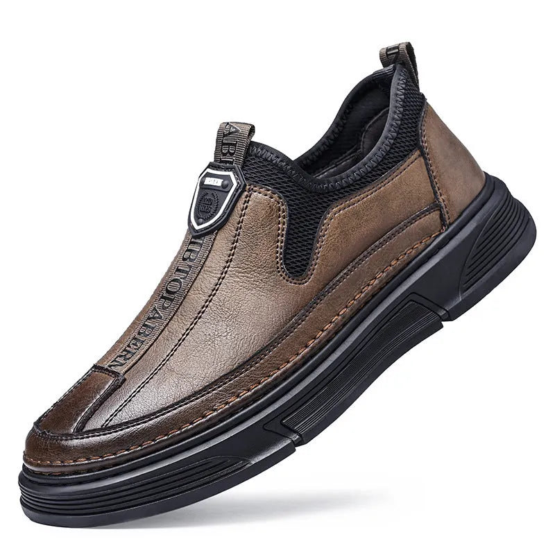 Men's solid colour leather casual shoes with round toe in Black and Brown options.