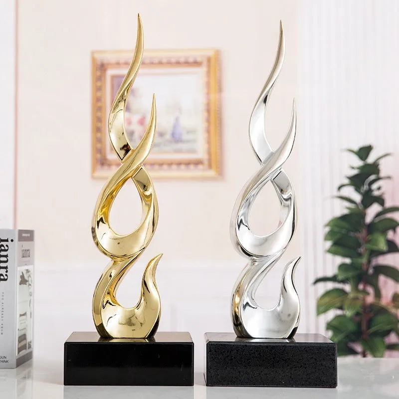 Modern resin festival decoration in bright gold metallic finish with half-handmade construction