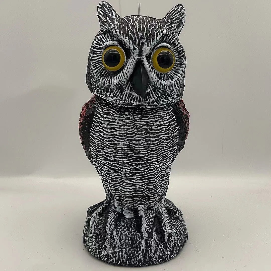 Realistic plastic artificial owl bird deterrent ornament with shaking head, for outdoor use.