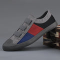Men's low-top canvas sneakers with elastic band fastening in multiple colour options