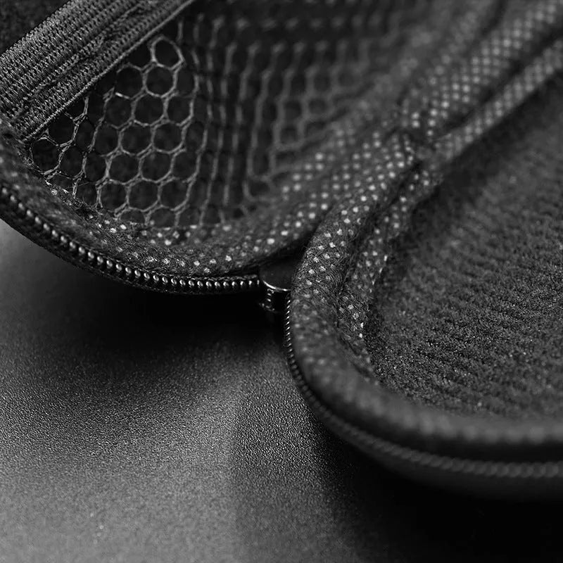 Black oval faux leather earphone storage bag with zipper, for EDX PRO and compatible models.