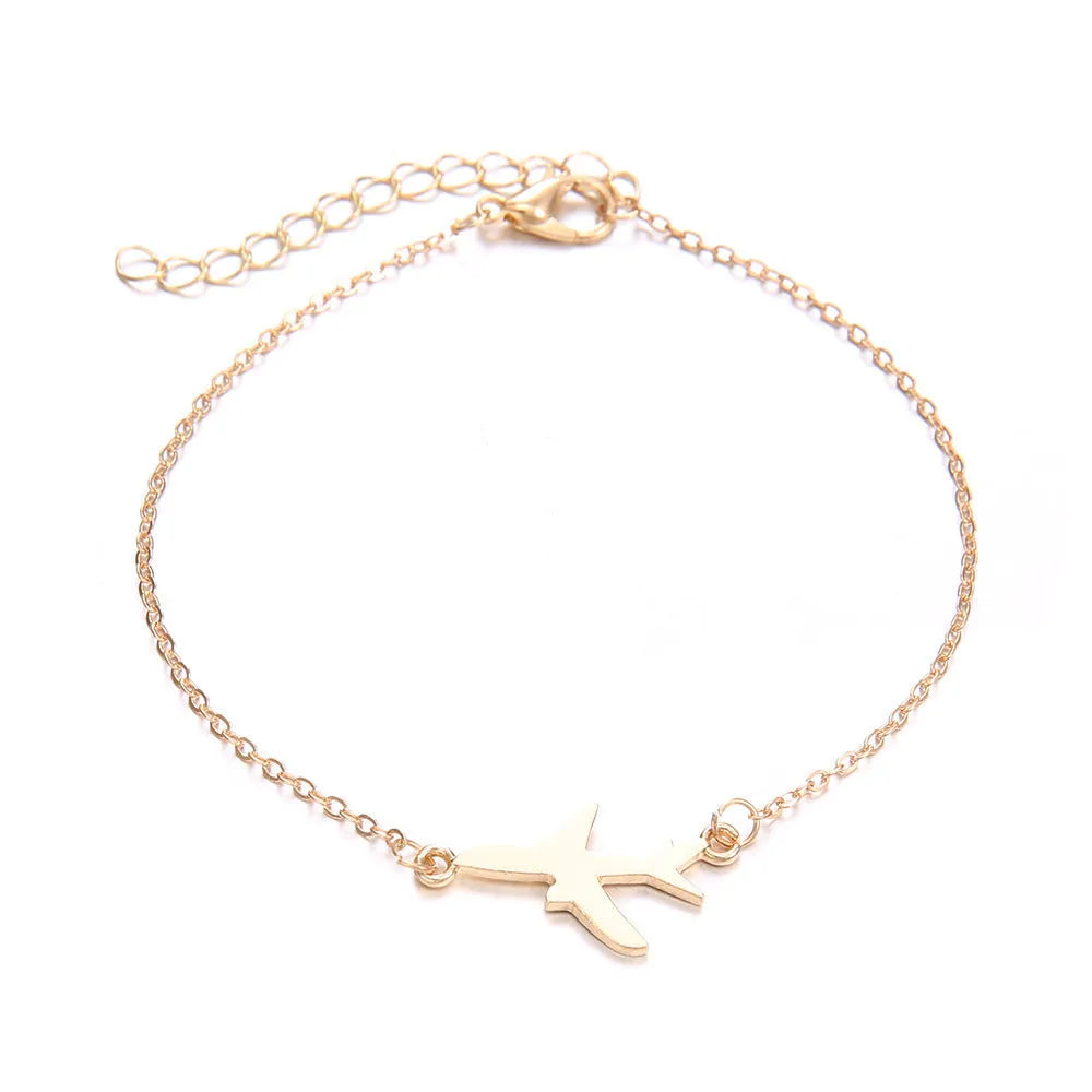 Three bohemian bracelets with alloy aircraft map heart charms in electroplated finish
