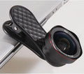 Black mobile phone wide-angle and macro camera lens kit with storage box and clip on a white background.
