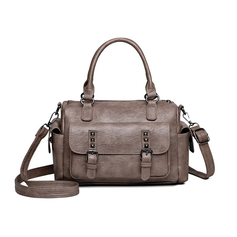 Vintage messenger bag in horizontal square shape with contrast stitching, shown in available colours
