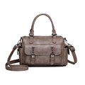 Vintage messenger bag in horizontal square shape with contrast stitching, shown in available colours